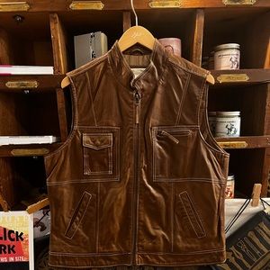 Coldwater Creek Leather Vest with multiple pockets.
